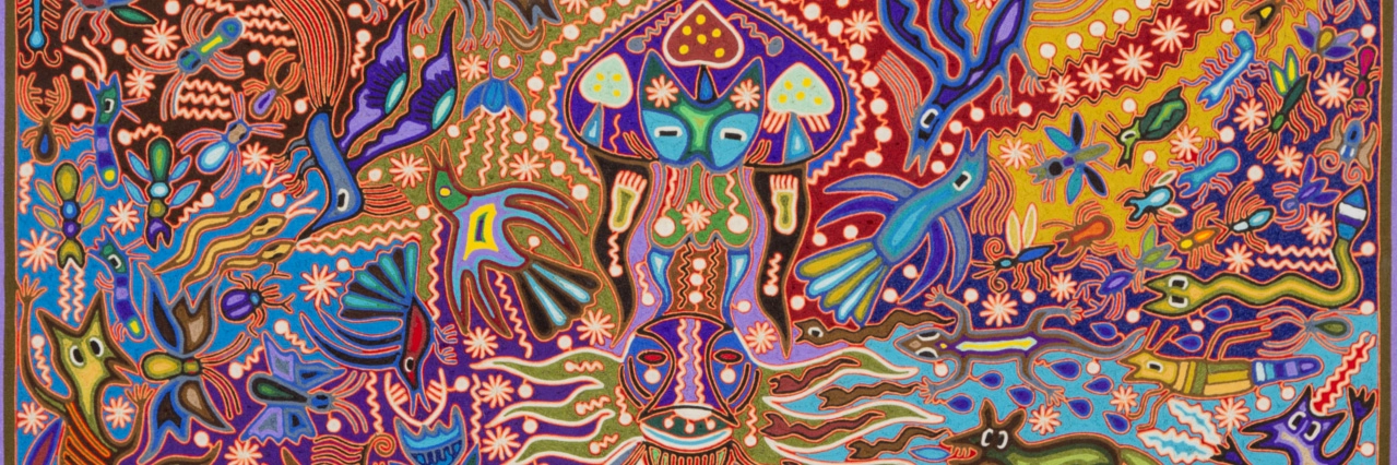 Detail of a Huichol yarn painting in vivid color from the firm's art collection